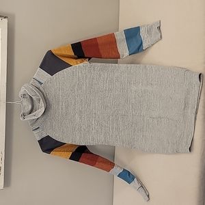 Long sleeve women's grey sweater with fall colored striped sleeves